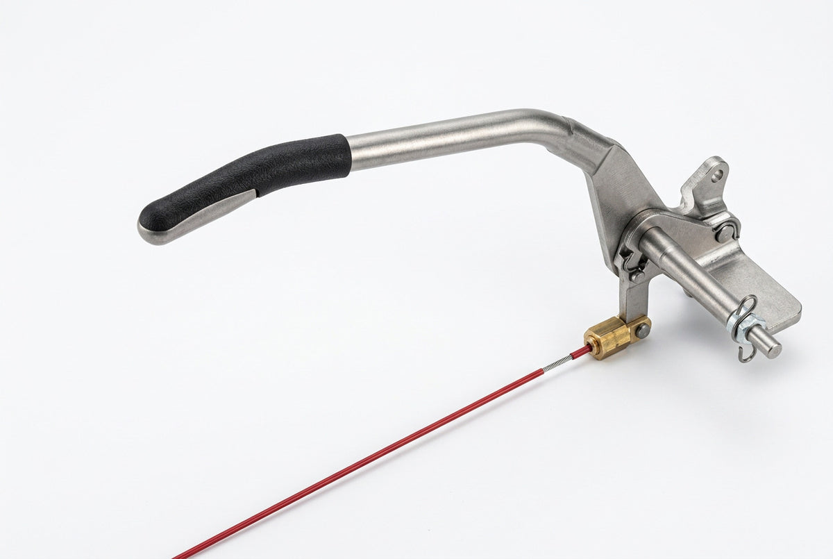 A handbrake assembly for trailers, featuring a metal lever with a black grip and a red breakaway cable.